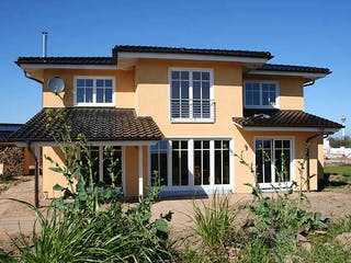 Fertighaus Conny (KfW-Effizienzhaus 40 EE) von Dammann-Haus Schlüsselfertig ab 557700€, Stadtvilla Außenansicht 2