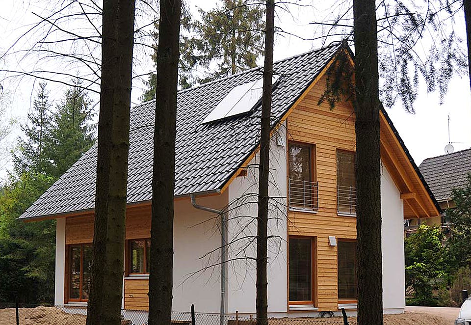 Fertighaus Isa (KfW-Effizienzhaus 40 EE) von Dammann-Haus Schlüsselfertig ab 297700€, Satteldach-Klassiker Außenansicht 1