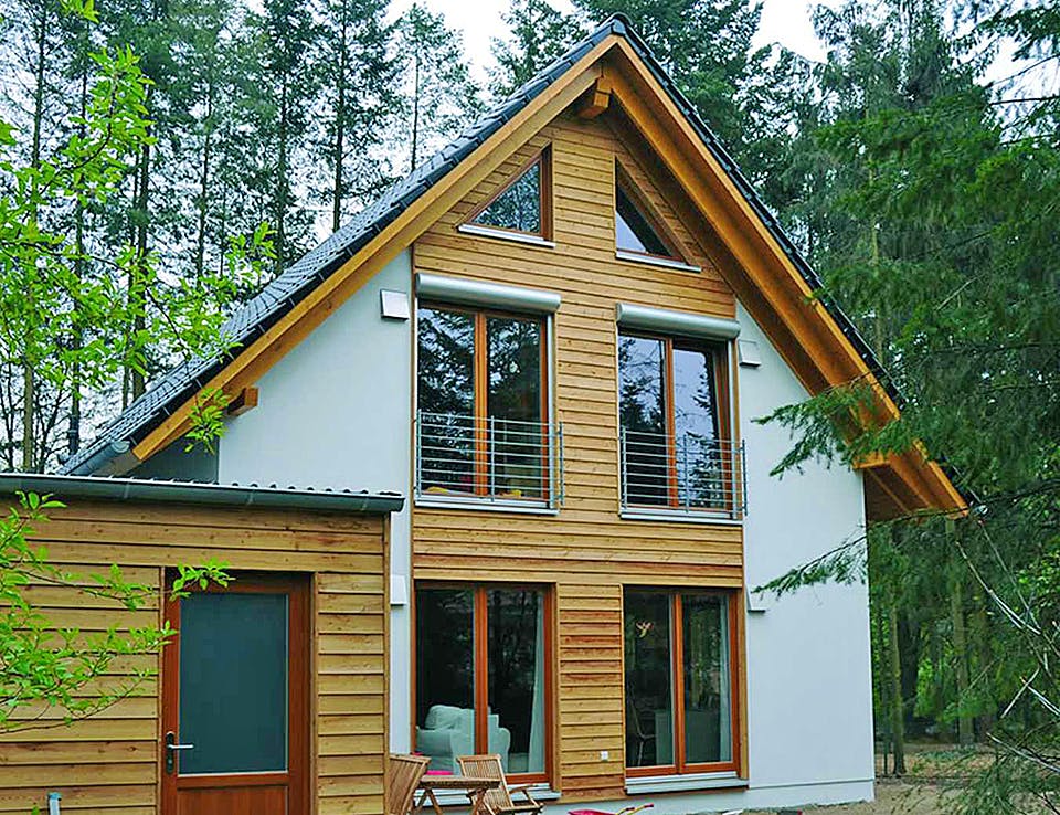 Fertighaus Isa (KfW-Effizienzhaus 40 EE) von Dammann-Haus Schlüsselfertig ab 297700€, Satteldach-Klassiker Außenansicht 2
