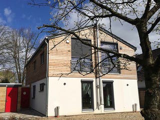 Fertighaus Nicole (KfW-Effizienzhaus 40 EE) von Dammann-Haus Schlüsselfertig ab 311700€, Satteldach-Klassiker Außenansicht 2