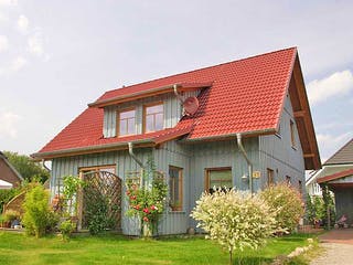 Fertighaus Tineke (KfW-Effizienzhaus 40 EE) von Dammann-Haus Schlüsselfertig ab 345300€, Satteldach-Klassiker Außenansicht 1