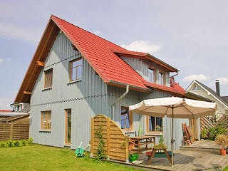 Fertighaus Tineke (KfW-Effizienzhaus 40 EE) von Dammann-Haus Schlüsselfertig ab 345300€, Satteldach-Klassiker Außenansicht 2