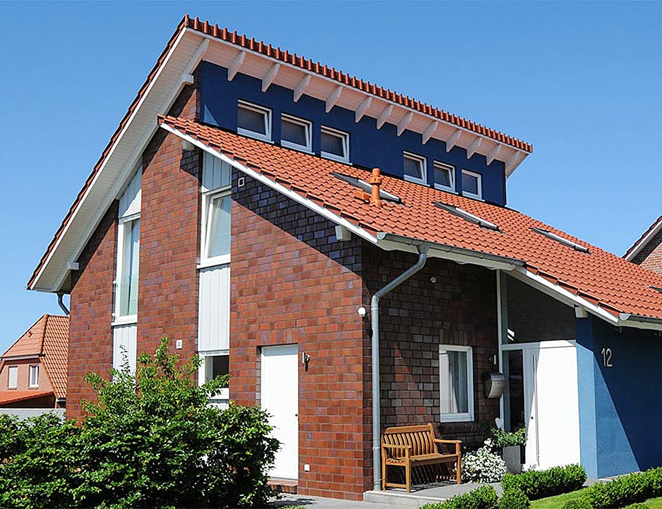 Fertighaus Yvonne (KfW-Effizienzhaus 40 EE) von Dammann-Haus Schlüsselfertig ab 368400€, Pultdachhaus Außenansicht 1