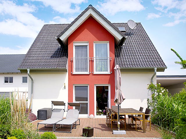 Massivhaus ICON 3+ mit Quergiebel von Dennert Massivhaus Ausbauhaus ab 264988€, Satteldach-Klassiker Außenansicht 1