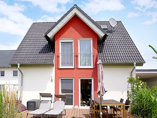 Massivhaus ICON 3 mit Quergiebel von Dennert Massivhaus Ausbauhaus ab 247288€, Satteldach-Klassiker Außenansicht 1