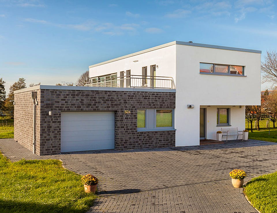 Massivhaus Bauhaus-Modern Classic 180 von ECO System HAUS, Cubushaus Außenansicht 2