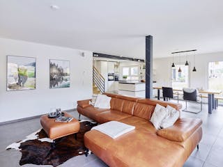 Fertighaus Dreifamilienhaus Chmel von Fertighaus WEISS - Mehrfamilienhäuser, Pultdachhaus Innenansicht 1