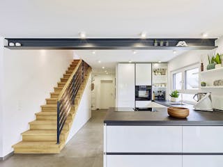 Fertighaus Dreifamilienhaus Chmel von Fertighaus WEISS - Mehrfamilienhäuser, Pultdachhaus Innenansicht 4