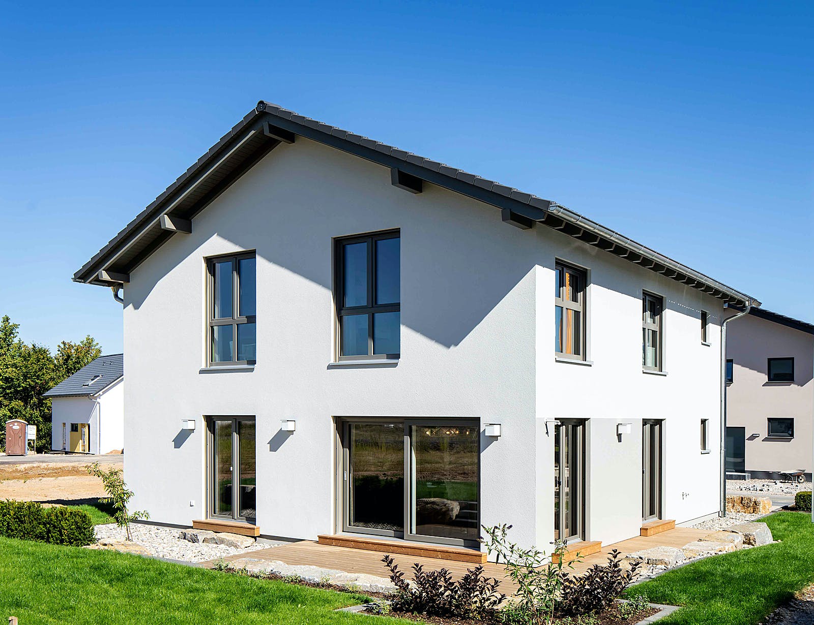 Fertighaus MH Büdingen - ARTIS 302 von FingerHaus Schlüsselfertig ab 405422€, Satteldach-Klassiker Außenansicht 1
