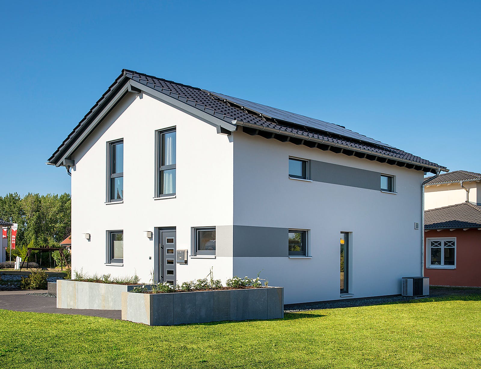 Fertighaus MH Leipzig - UNO 2.0 200 B S180 von FingerHaus Schlüsselfertig ab 353172€, Satteldach-Klassiker Außenansicht 2