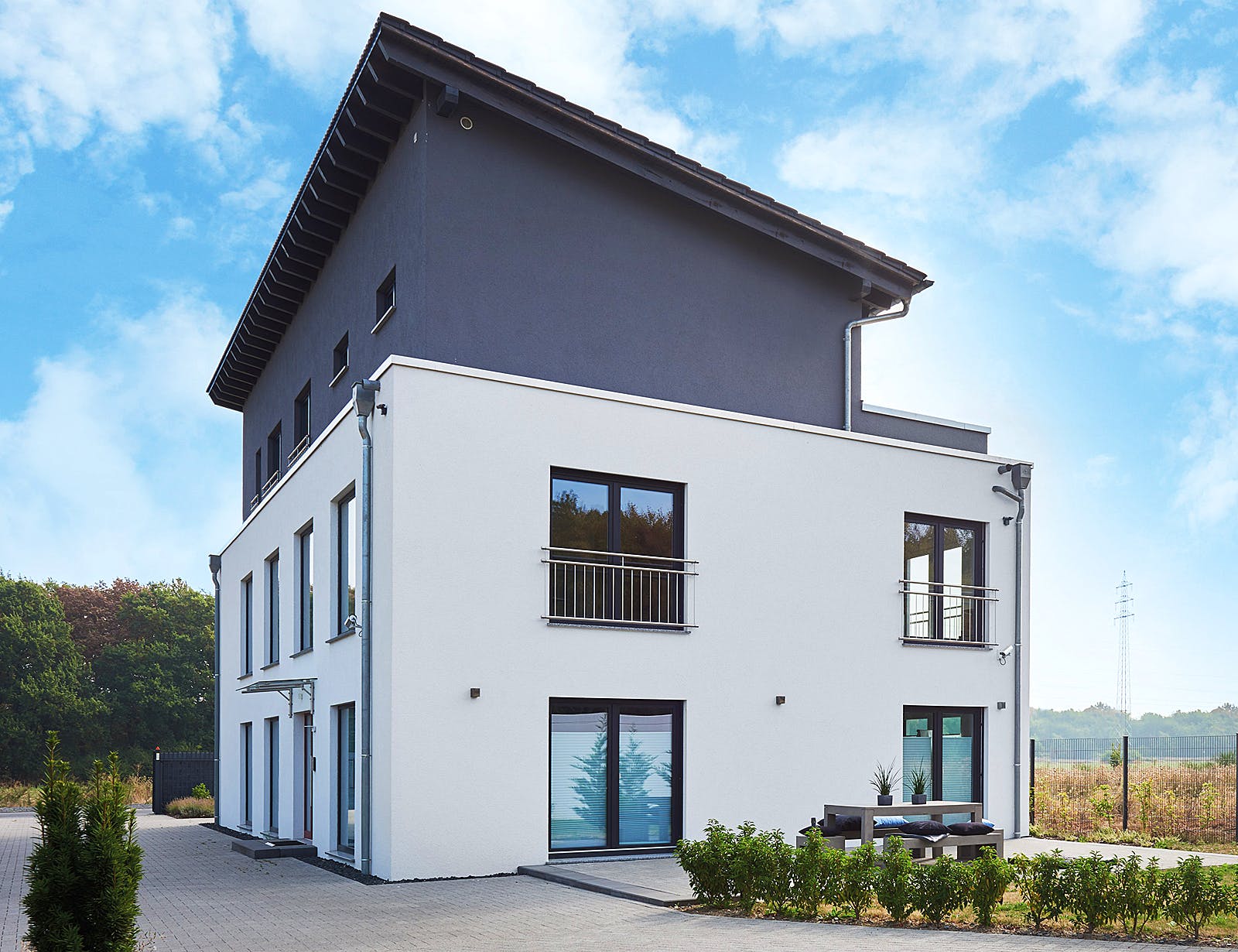 Fertighaus Tasko von Fingerhut Haus Schlüsselfertig ab 973096€, Pultdachhaus Außenansicht 1