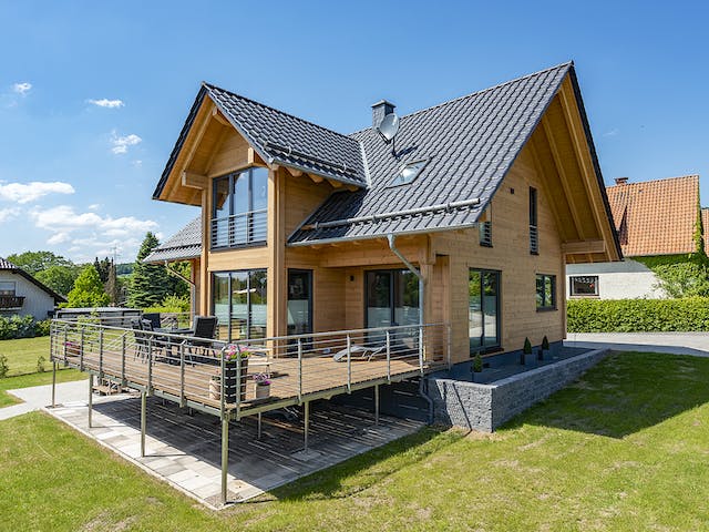 Blockhaus Köterbergblick von Fullwood Wohnblockhaus Ausbauhaus ab 190000€, Blockhaus Außenansicht 2