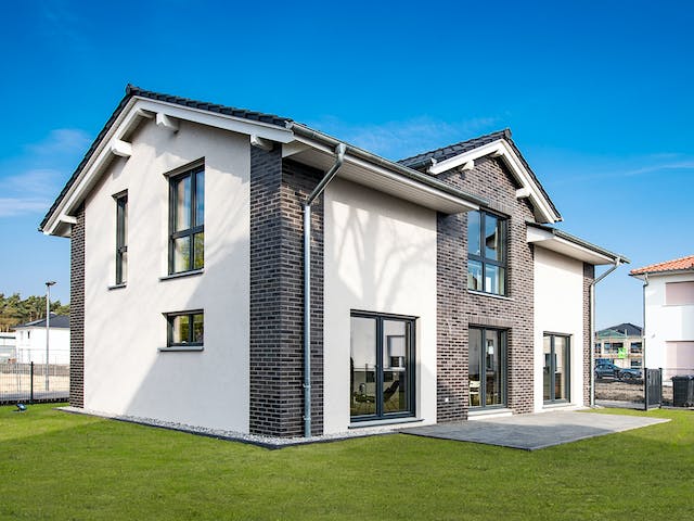 Massivhaus Trient von HELMA MASSIVHAUS Schlüsselfertig ab 378250€, Satteldach-Klassiker Außenansicht 10