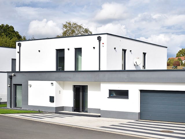 Massivhaus Stylisches Flachdachhaus von RheinMassiv Massivhäuser, Cubushaus Außenansicht 1
