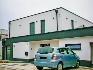 Massivhaus Stylisches Flachdachhaus von RheinMassiv Massivhäuser, Cubushaus Außenansicht 2