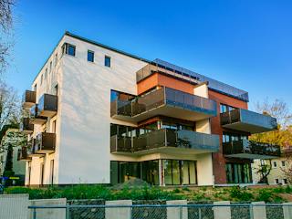 Massivhaus Mehrfamilienhaus mit Luxus und Eleganz von RheinMassiv Massivhäuser, Stadtvilla Außenansicht 1