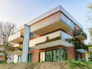 Massivhaus Mehrfamilienhaus mit Luxus und Eleganz von RheinMassiv Massivhäuser, Stadtvilla Außenansicht 5