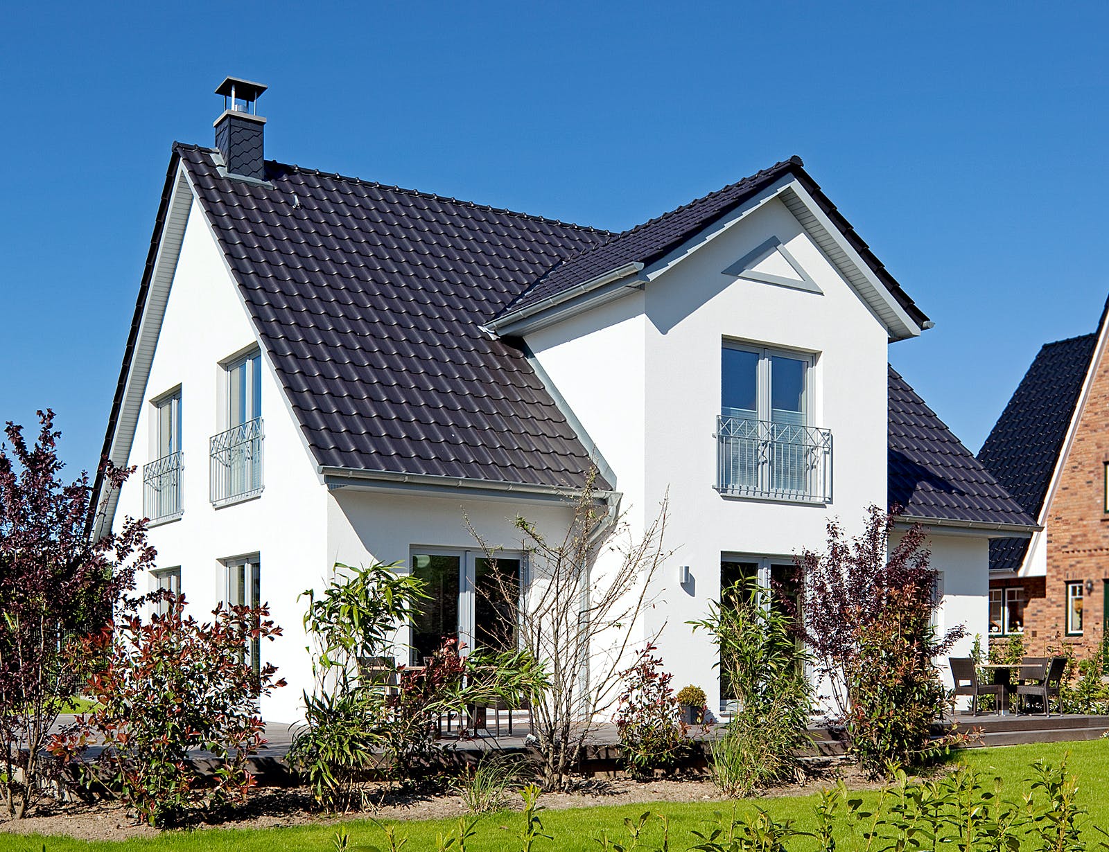 Massivhaus Behringer von Plan-Concept Massivhaus, Satteldach-Klassiker Außenansicht 2