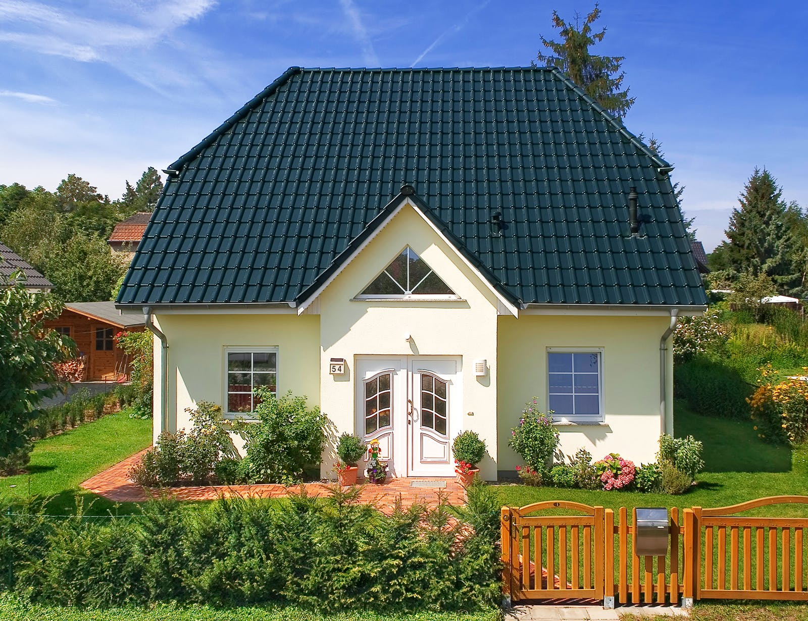 Massivhaus Landhaus 142 von ROTH-MASSIVHAUS Schlüsselfertig ab 277900€, Satteldach-Klassiker Außenansicht 1