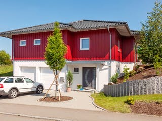 Fertighaus E 10-129.2 - Skandinavischer Bungalow von SchwörerHaus Schlüsselfertig ab 403273€, Bungalow Außenansicht 2