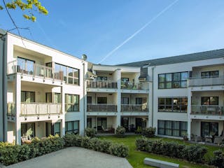 Fertighaus Mehrfamilienhaus mit 12 Wohneinheiten von WeberHaus - Mehrfamilienhäuser, Stadtvilla Außenansicht 2