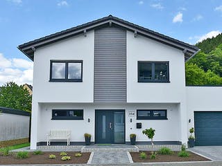 Fertighaus Haus Nübold-Bracht von Wiese und Heckmann, Satteldach-Klassiker Außenansicht 3